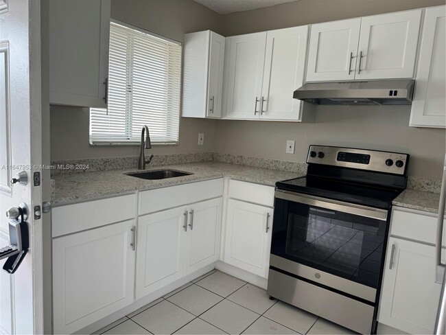 Photo - 3051 W 76th St Condominio Unidad D-211