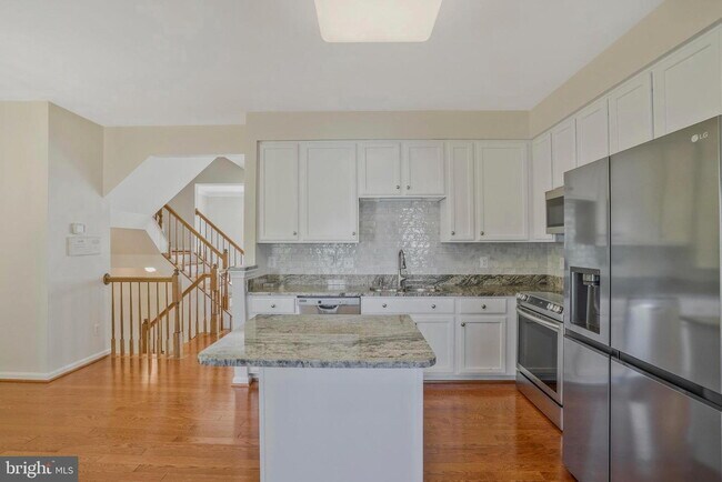 Photo - This beautifully maintained brick-front, three-level townhome is located in a highly sought-after...