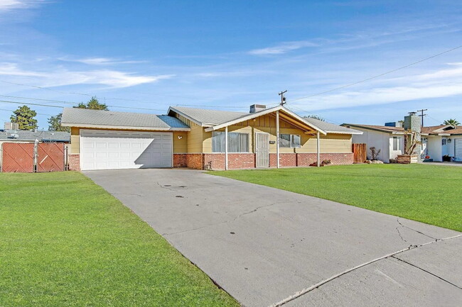 Photo - Beautifully Updated 3 Bedroom Home with Pool, Spacious Backyard & 2-Car Garage!