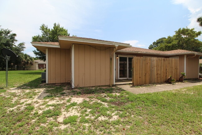 Photo - Gulf Breeze 2BR Apartment in Greenbriar with Large Bedrooms, Fenced Patio, Huge Backyard & Water/... Unit C