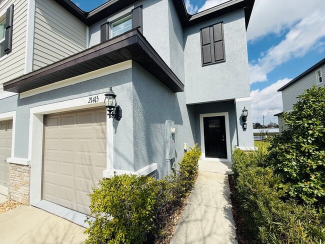 Building Photo - MOVE IN SPECIAL - Townhouse in Land O' Lakes - The Townes at Lake Thomas