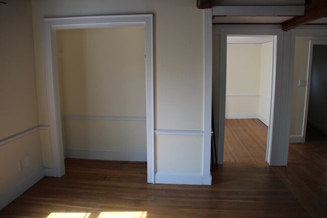 Living Room (includes additional closet/storage space) doorway to dining room on right - 7 Allen Ct Unit 7 Allen Court