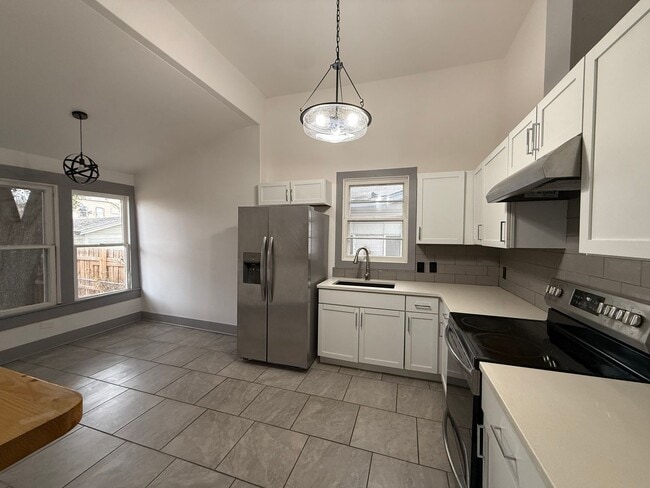 Photo - Updated 3 Bed / 2 Bath Near Downtown | Move-In Ready + Fridge Included