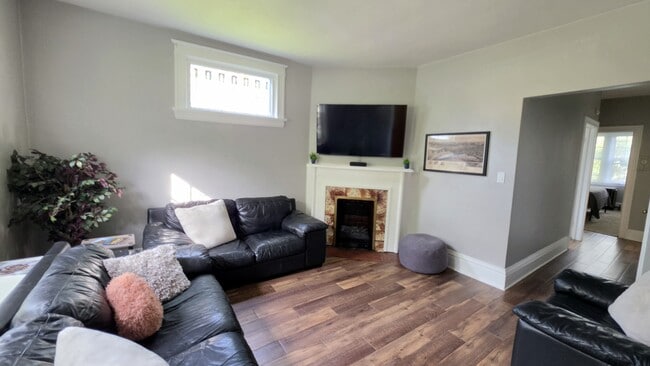 Another view of the spacious living area with easy access to both bedrooms.