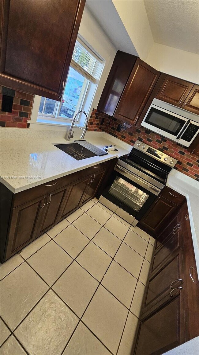 Building Photo - 14910 SW 82nd Terrace Unit 15-103