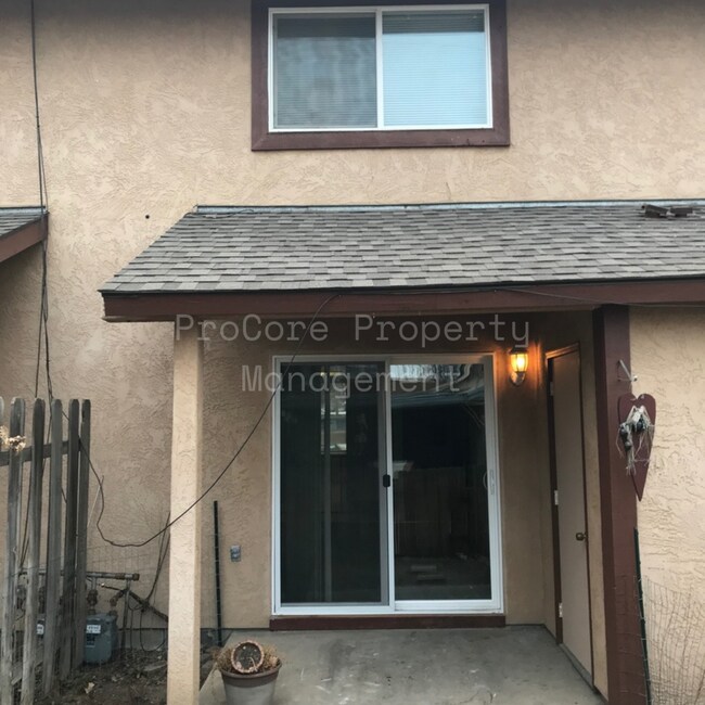 Photo - $1300...2Bed 1.5 Bath, Small Fenced in Covered Patio on Back, Storage