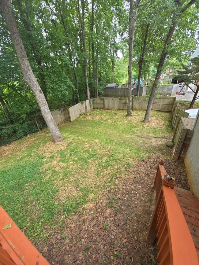 Photo - Bright 3 Bedroom Home with Basement, Backyard, and Garage