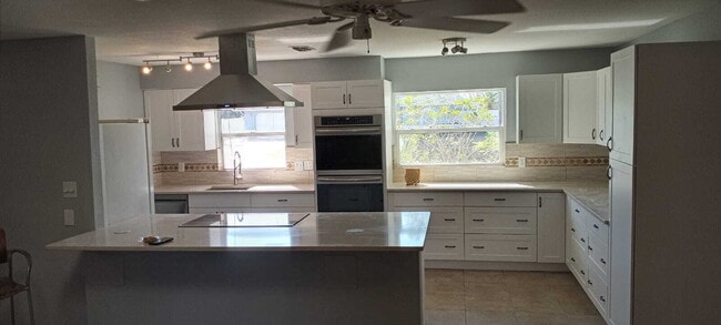 Photo - 5-Bedroom Pool Home with 2 Full Baths - Spacious 2373 Sq Ft Home in Englewood's Prime Location!"