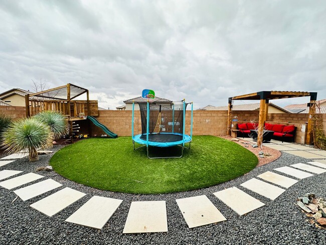 Building Photo - STUNNING Back yard!  Level II EV Charger!