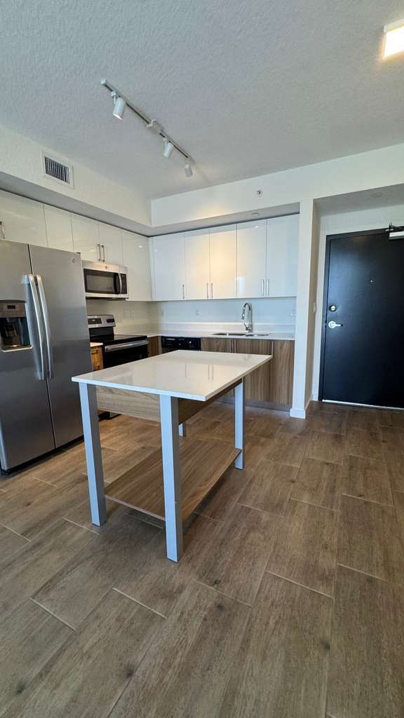 Building Photo - 6467 SW 10th St Unit A1