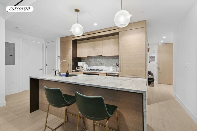 Photo - 215 W 28th St Condo
