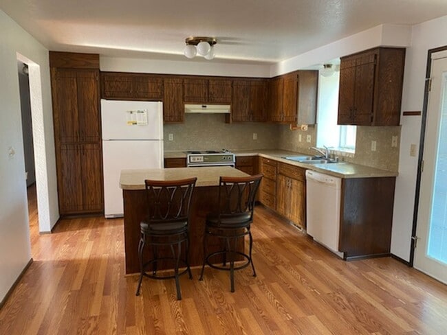 Photo - Rambler Fenced Backyard