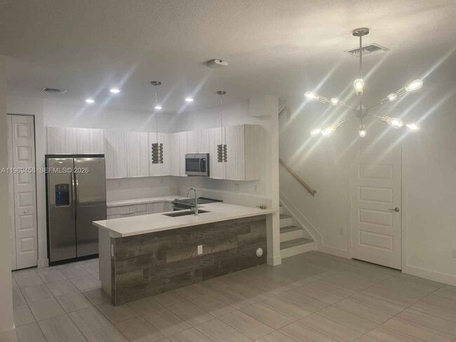 Building Photo - 10445 NW 81st Terrace Unit 10045