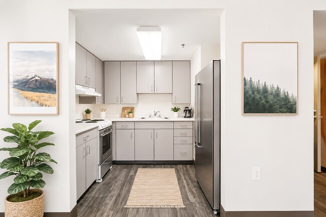 Cocinas renovadas en Guild House. - Guild House West 62+ Senior Apartments