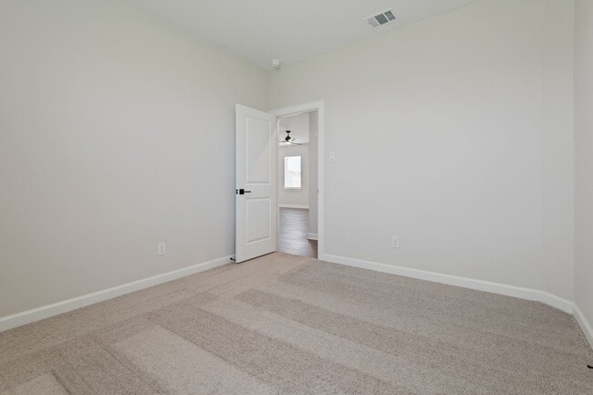 Building Photo - 1023 Whispering Winds Dr