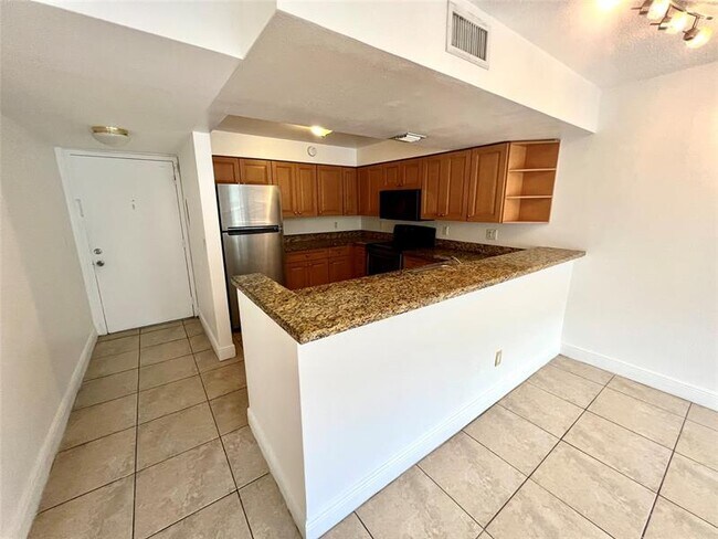 Photo - 5221 Geneva Ct Unit 208