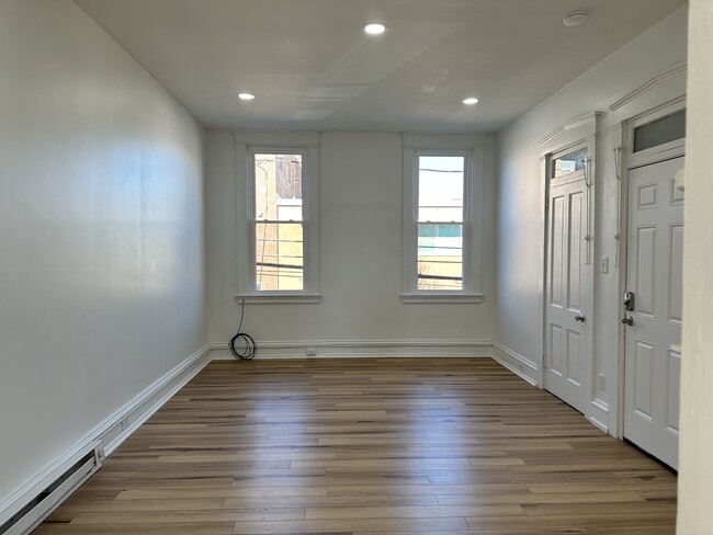 Living room - 322 W James St Apartments Unit 2