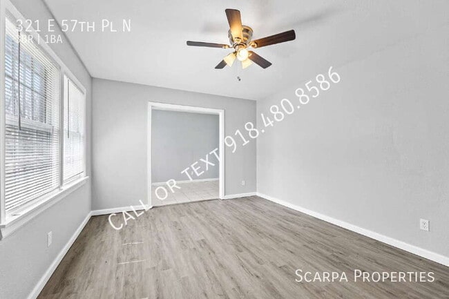 Photo - 321 E 57th Pl N