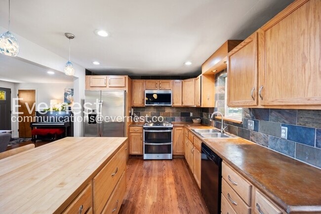 Photo - 4-Bed/2-Bath House Charming Home with Fenced Yard/ Available Now!