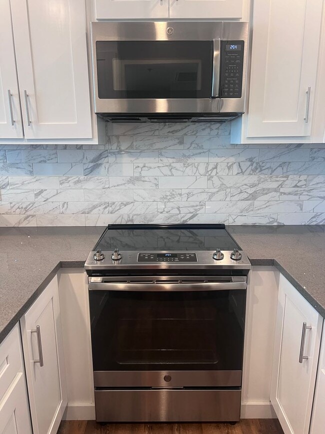 Photo - Spacious 1 Bedroom with Tons of Light, High Ceilings & Full Size Washer/Dryer Inside Unit 113
