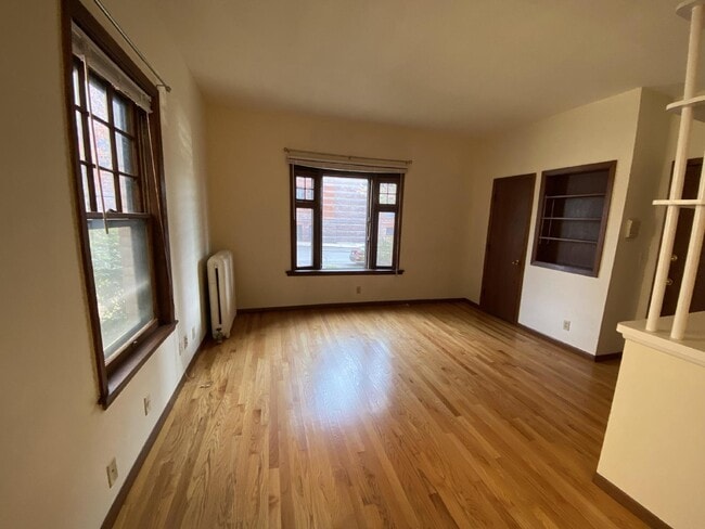 Photo - 1 Bed 1 Bath Historic Preserved Douglas Apartments in Desirable Lowry Hill Available April 1st. Unit 1