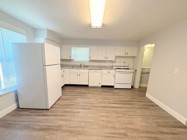 Photo - Spacious 4-Bedroom Home with Fenced Backyard