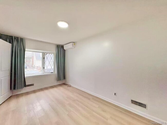 Photo - 23-47 128th St Unit 1FL