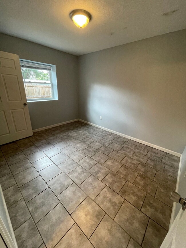 Photo - Open floor plan, four-bedroom two-bathroom with washer and dryer Unit 2