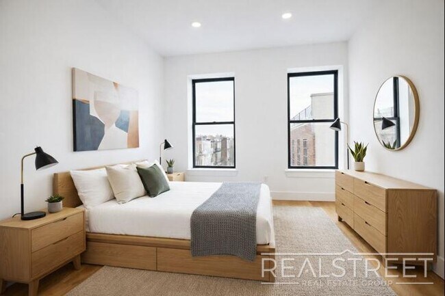 Photo - Modern & Bright 2BR with Rooftop Deck, Central A/C & Dishwasher | Bed-Stuy/Bushwick Border Unit 4B