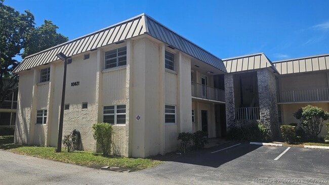 Building Photo - 10821 N Military Trl Unit 4