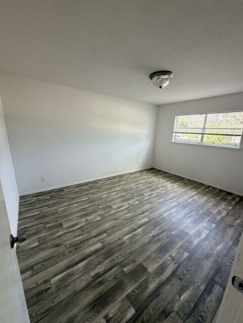 Bedroom- Upgraded Unit - Cimarron Apartments