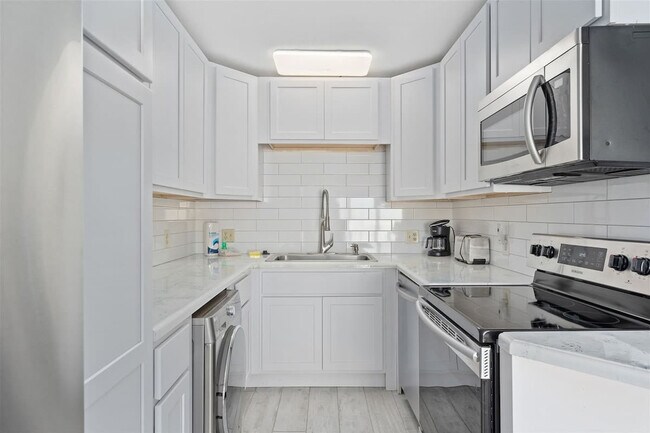Photo - 8743 Thomas Dr Unit SI FL10-ID1354925P
