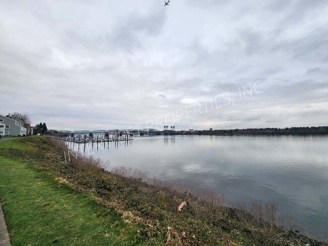 Photo - 2 BD Condo with River View, washer/dryer, microwave and W/S/G&L included.