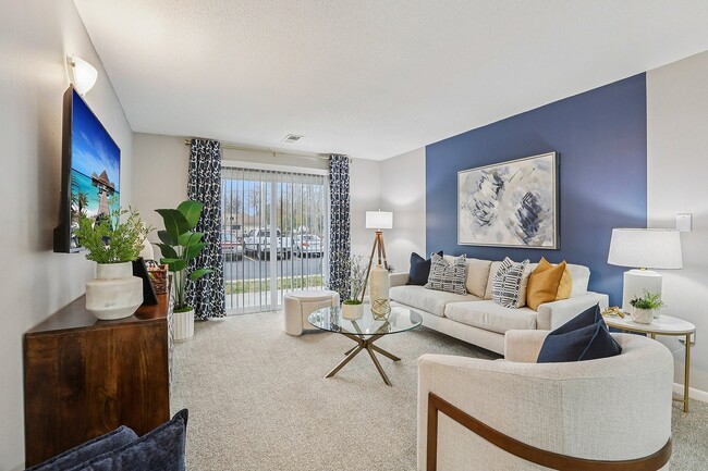 Spacious living room with carpet