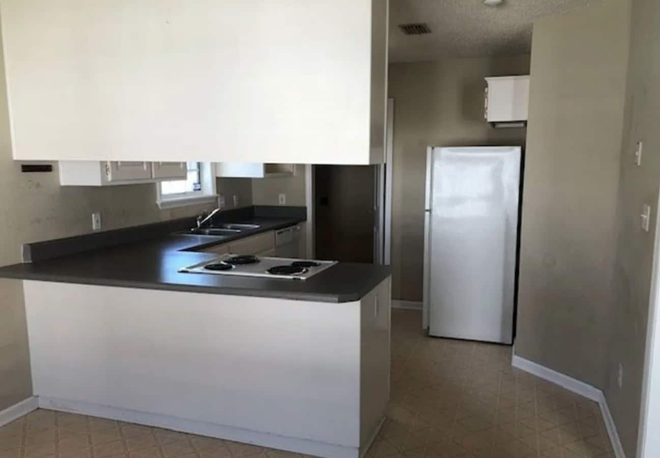Photo - Cozy 3 Bedroom Home with Spacious Kitchen and Private Backyard