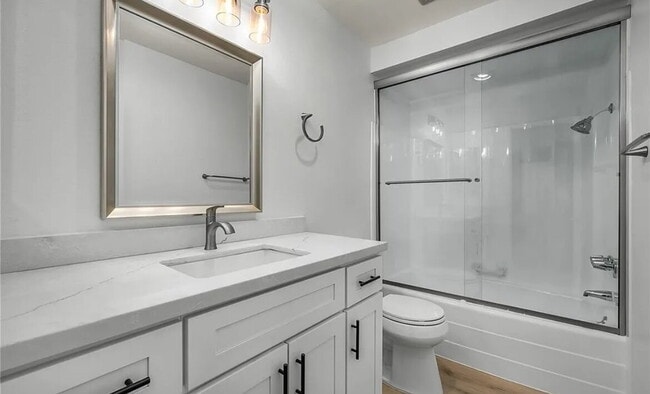 Building Photo - A completely updated first-floor Estates L... Rental
