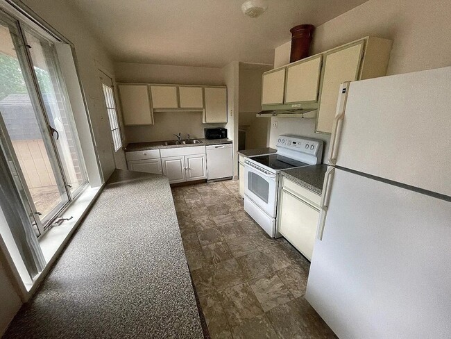 Photo - Charming 4-Bed 2 Bath Bi Level Home in Martin Acres