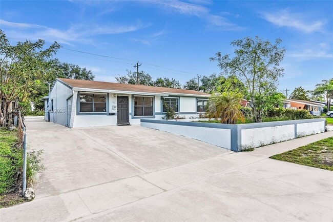 Building Photo - 7041 Raleigh St Unit B