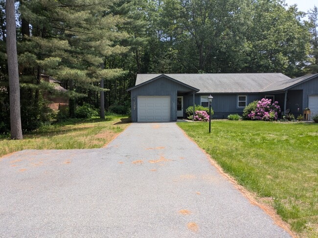BAcks to woods, extra parking pad, paved - 137 Thimbleberry Rd