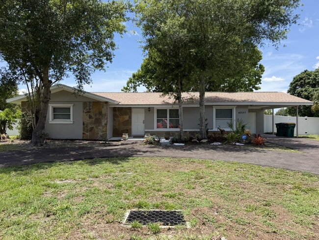 Building Photo - "Charming 3-Bedroom Home with Gleaming Hardwood Floors!"