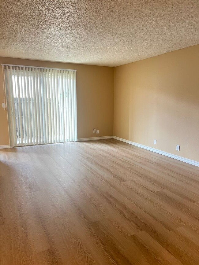 Photo - 1 Bed • 1 Bath Downstairs Unit - Updated Flooring Unit 3434-57