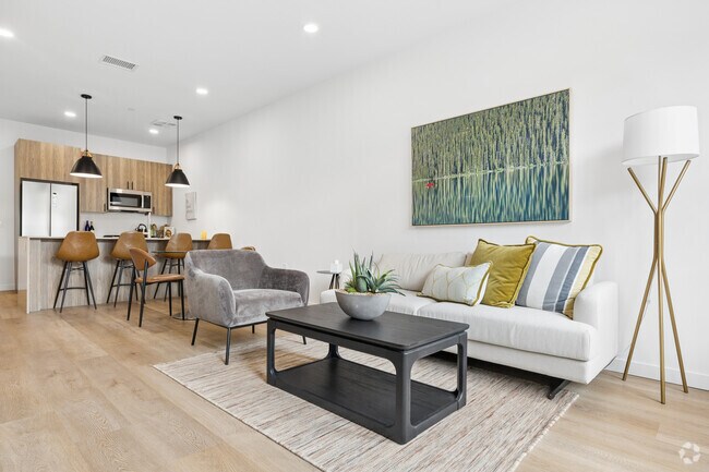 1BR, 1BA - 750SF - Living Room and Kitchen - Ardea Pointe at Mill Pond
