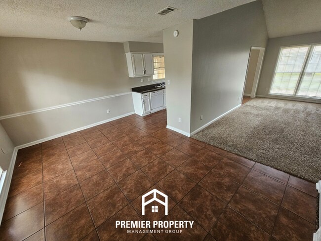 Photo - Quiet Cove Living in 38115 | 3BR/2BA with Brick Fireplace & Fenced Yard