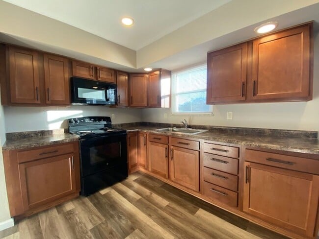 Photo - Welcome to this charming two-bedroom, one-bathroom double located in the heart of Springfield, OH+