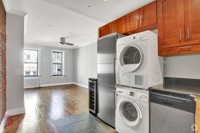 Building Photo - 411 E 12th St Unit PHW Rental
