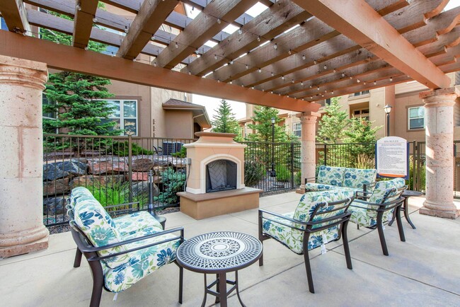 Outdoor fireplace and seating - Talon Hill Apartments