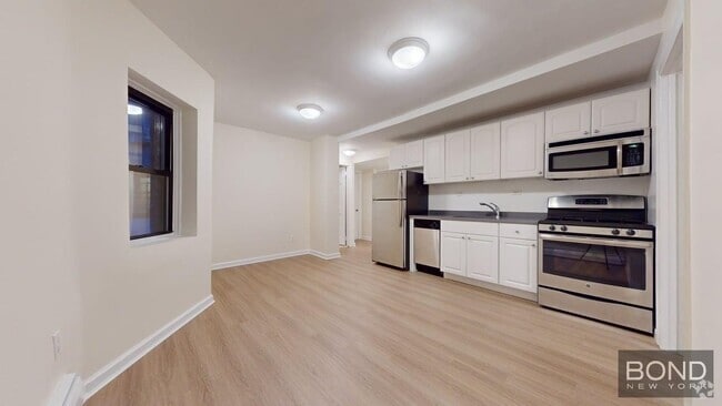 Building Photo - 150 E 84th St Unit 1O Rental