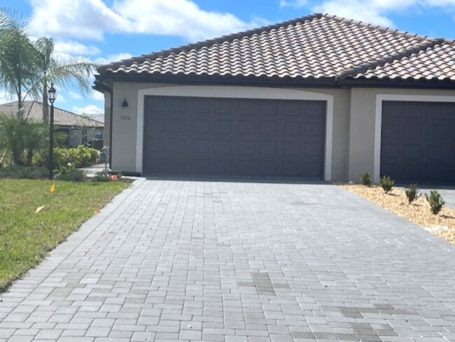 Building Photo - New Construction 2 Bedroom PLUS a Home Office Available in Lorraine Lakes