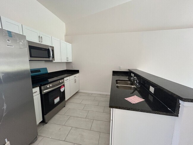 Coming Soon  Newer  3/2 Duplex -1 car garage