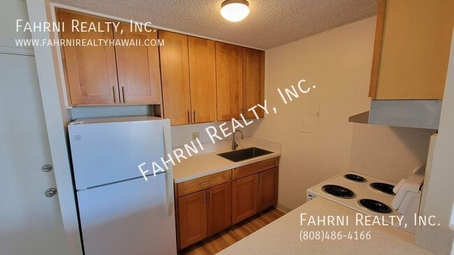 Building Photo - 98-1038 Moanalua 1404- Rental
